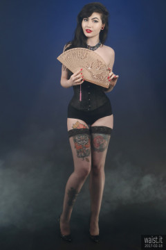 2017-02-18 Alexa Rose in tightlt-laced black Chinese underbust corset, worn over black strapless bra and firm control pantie girdle