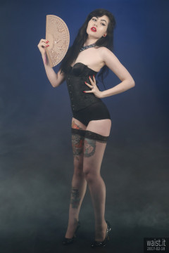 2017-02-18 Alexa Rose in tightlt-laced black Chinese underbust corset, worn over black strapless bra and firm control pantie girdle