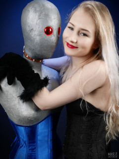 2017-05-19 Laura Sele tightly laced black underbust corset worn over black Miraclesuit bodyshaper