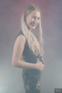 2017-05-19 Laura Sele cheongsam dress sticking her tummy out