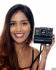 2017-09-18 Faranas in neoprene bikini with Polaroid Land camera