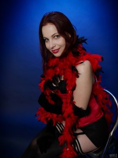 2017-11-05 Maddie Skye in tightly laced red Vollers corset worn over black bra, roll-on girdle and stockings