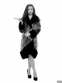 Charlene Joy in vintage fur coat, worn over her competition bikini