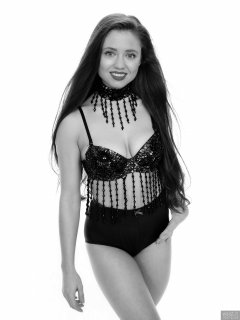 Charlene Joy in jewelled dance top and blue 60's style lycra pantie girdle worn as hotpants