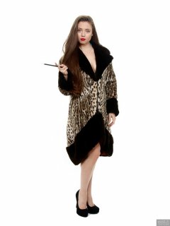 Charlene Joy in vintage fur coat, worn over her competition bikini