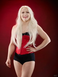 2018-03-17 Dayna Nirvana in tightly-laged red Vollers corset, over modified back boob tube and tight black control briefs worn as hot-pants