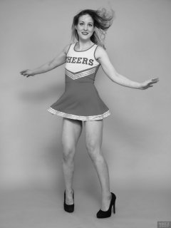 2018-04-07 Annie91 in her cheerleader costume, worn over red one-piece swimsuit