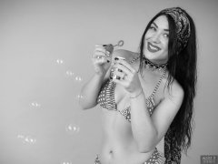 2018-06-15 Tatjana Bastet blowing bubbles in red and white polka-dot bikini