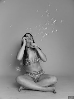 2018-06-15 Tatjana Bastet blowing bubbles in red and white polka-dot bikini