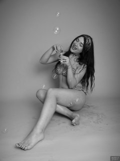 2018-06-15 Tatjana Bastet blowing bubbles in red and white polka-dot bikini