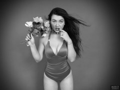 2018-06-15 Tatjana Bastet in purple vintge-style tummy-control one-piece swimsuit