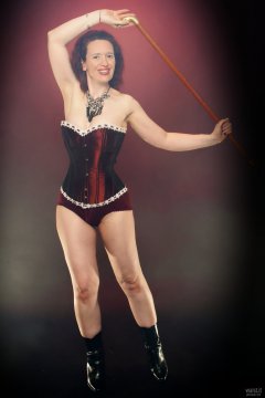 2018-07-07 Chiara in her own tightly-laced, long-line burgundy over-bust corset, worn over firm-control burgundy pantie-girdle, worn as hotpants
