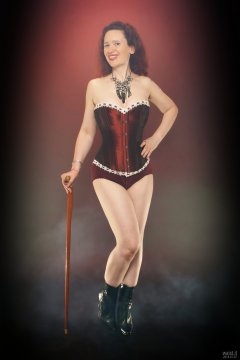 2018-07-07 Chiara in her own tightly-laced, long-line burgundy over-bust corset, worn over firm-control burgundy pantie-girdle, worn as hotpants