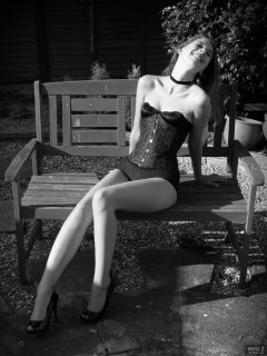 2018-07-25 Twinklenose, in the garden, in tightly-laced black underbust corset worn over black bra and black pantie girdle, worn as hotpants