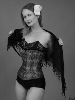 2018-09-16 Saffine in her own tightly-laced, green brocade, overbust corset and style 210 pantie girdle, worn as hotpants