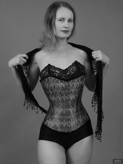 2018-09-16 Saffine in her own tightly-laced, green brocade, overbust corset and style 210 pantie girdle, worn as hotpants