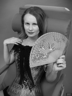 2018-09-16 Saffine in her own tightly-laced, green brocade, overbust corset and style 210 pantie girdle, worn as hotpants