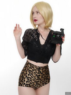 2018-09-16 Saffine with 1970's vintage Polaroid Land camera, in black strapless bra top, black bolero and animal print pantie girdle worn as hotpants