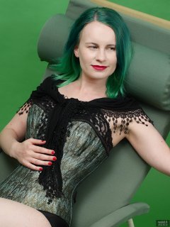 2018-09-16 Saffine in her own tightly-laced, green brocade, overbust corset and style 210 pantie girdle, worn as hotpants