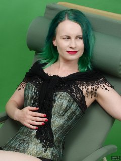 2018-09-16 Saffine in her own tightly-laced, green brocade, overbust corset and style 210 pantie girdle, worn as hotpants
