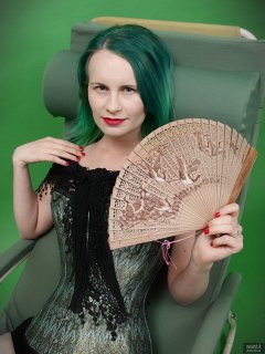 2018-09-16 Saffine in her own tightly-laced, green brocade, overbust corset and style 210 pantie girdle, worn as hotpants