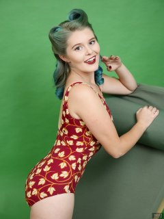 2018-11-04 Sophie Pixie poses on Relaxator 365 lounger chair, wearing red and gold vintage tummy-control one-piece swimsuit