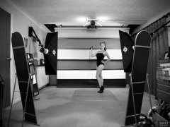 2018-11-04 Sophie Pixie in black vintage-style tummy-control swimsuit, demonstrating the studio