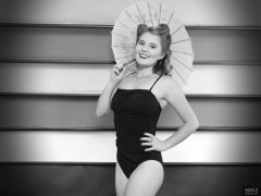 2018-11-04 Sophie Pixie in black vintage-style tummy-control swimsuit, demonstrating the studio