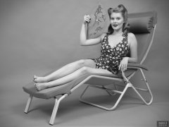 2018-11-04 Sophie Pixie poses on Relaxator 365 lounger chair, wearing red and gold vintage tummy-control one-piece swimsuit