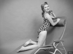 2018-11-04 Sophie Pixie poses on Relaxator 365 lounger chair, wearing red and gold vintage tummy-control one-piece swimsuit