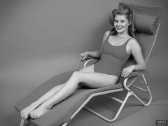 2018-11-04 Sophie Pixie poses on Relaxator 365 lounger chair, wearing red "baywatch" style one-piece swimsuit