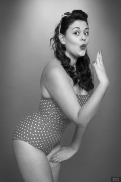 2018-12-15 Darcy Bennet in her own red and white polka-dot one-piece swimsuit