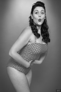 2018-12-15 Darcy Bennet in her own red and white polka-dot one-piece swimsuit