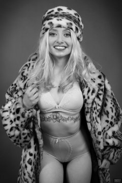 2019-01-12 Domii in fur coat, worn over golden bra and pantie girdle