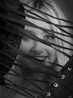 2019-01-12 Domii looking through the laces, in black boob tube and black pantie girdle worn as hotpants