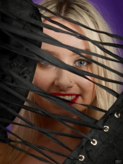 2019-01-12 Domii looking through the laces, in black boob tube and black pantie girdle worn as hotpants