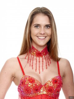 2019-02-10 JaySeaW in alternative Wonderwoman costume: Red dance-top and choker, tightly-laced red underbust corset and tight shiny black lycra leggings.