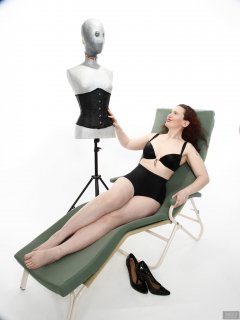 2019-03-30 Chiara relaxing on Relaxator 365 in black bra and black pantie girdle, worn as hotpants
