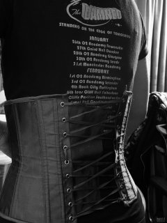 2019-03-30 Chiara in tightly-laced blue underbust corset and her own "Damned" T-shirt