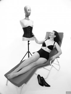 2019-03-30 Chiara relaxing on Relaxator 365 in black bra and black pantie girdle, worn as hotpants