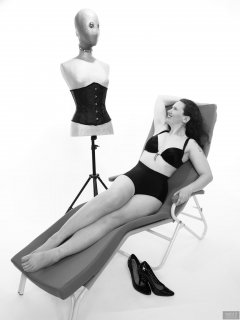 2019-03-30 Chiara relaxing on Relaxator 365 in black bra and black pantie girdle, worn as hotpants