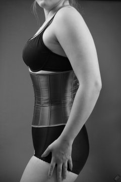 2019-05-04 CloEliza in purple tightly-laced underbust corset, worn over black bra and black style 210 pantie girdle, worn as hotpants to give a nice smooth line