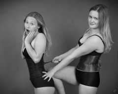 2019-05-04 Corset fun: Fabiene being laced rather tightly by her friend CloEliza