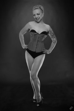 2019-05-25 KL Modelling - in tightly-laced red vollers overbust corset, worn over tight black Miraclesuit bodyshaper