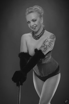 2019-05-25 KL Modelling - in tightly-laced red vollers overbust corset, worn over tight black Miraclesuit bodyshaper