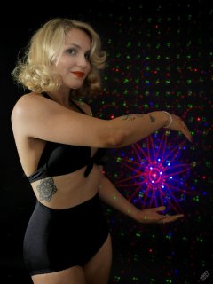 2019-09-07 VZ-Retro - in black bra top and black "style 210" pantie girdle, worn as hotpants - lit by LED, with laser-gobo background