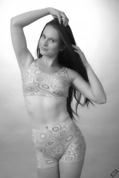 2019-09-21 Kristine Gold - in matching tight pink-and-white lycra sports bra top and shorts set