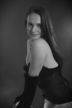 2019-09-21 Kristine Gold - in tightly-laced black underbust corset worn over black Miraclesuit strapless one-piece bodyshaper