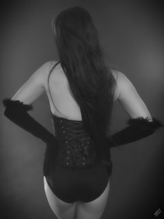 2019-09-21 Kristine Gold - in tightly-laced black underbust corset worn over black Miraclesuit strapless one-piece bodyshaper