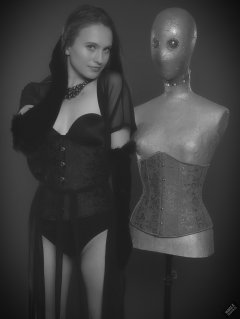 2019-09-21 Kristine Gold - in tightly-laced black underbust corset worn over black Miraclesuit strapless one-piece bodyshaper